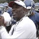 Jayhawks coach Turner Gill with his team (KUAthletics on YouTube)